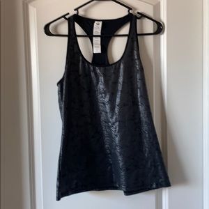 Fabletics tank top with shiny textured pattern.